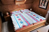 Sleeping room with double bed